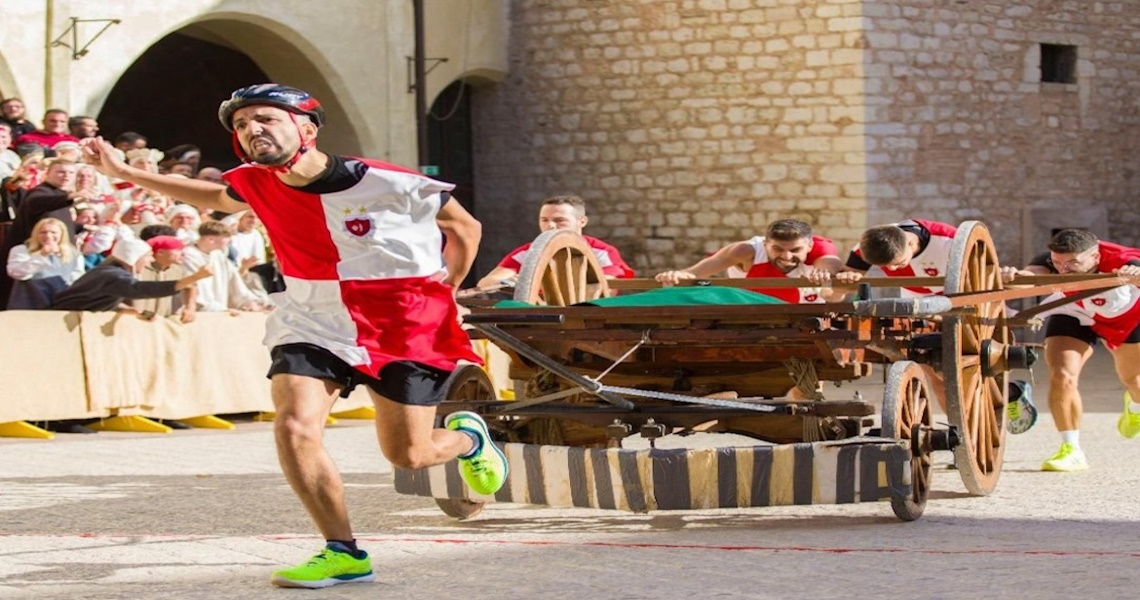 detail of the Palio dei Terzieri competition, with the float and team of Terziere Piano - Trevi